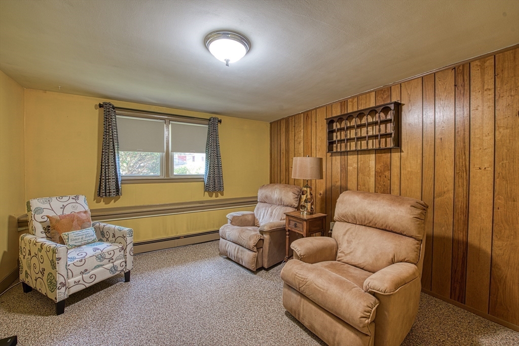 150 Pond Street Sharon, MA 02067 - Photo 19 of 26 a living room with furniture and a window