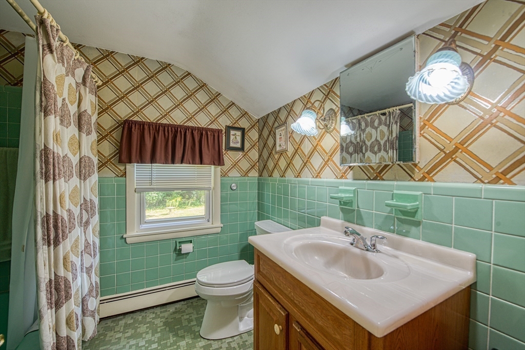 150 Pond Street Sharon, MA 02067 - Photo 22 of 26 a bathroom with a sink toilet and mirror