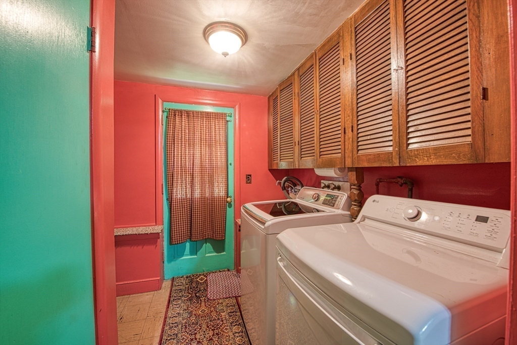 150 Pond Street Sharon, MA 02067 - Photo 23 of 26 a utility room with dryer and washer