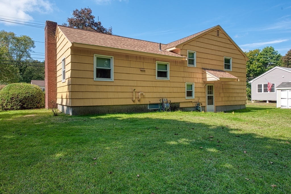 150 Pond Street Sharon, MA 02067 - Photo 25 of 26 a front view of a house with a yard