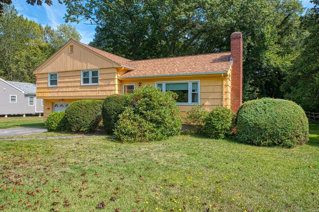 150 Pond Street Sharon, MA 02067 - Photo 3 of 26 a view of a house with backyard and garden