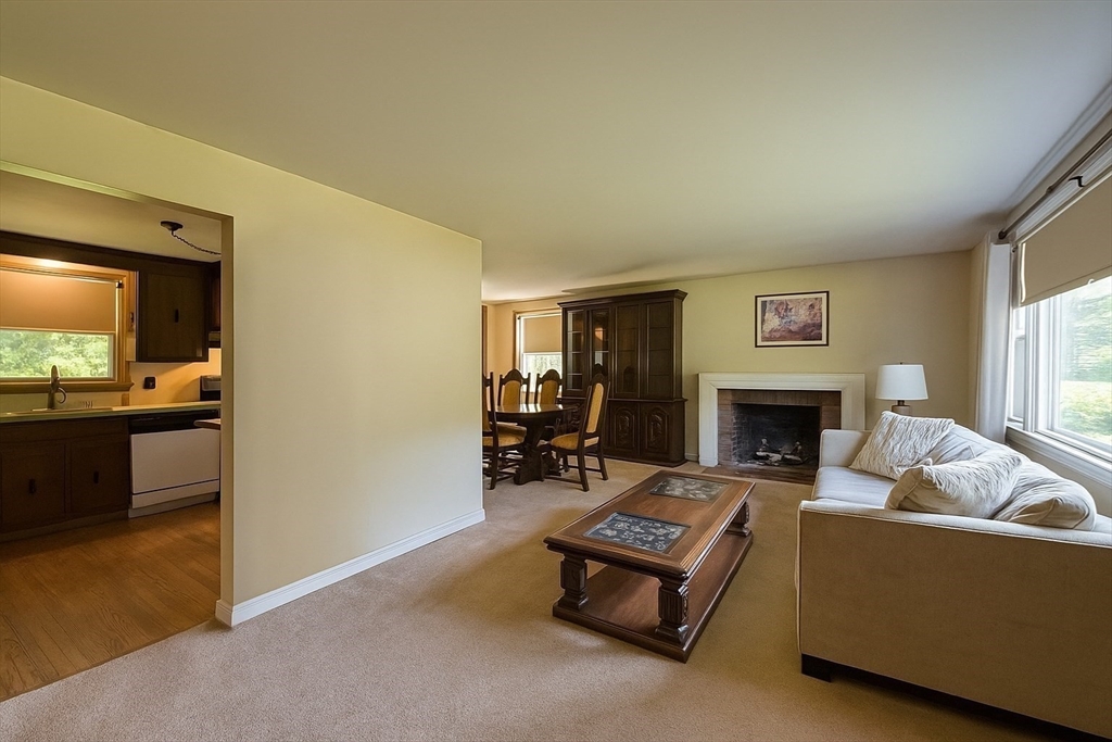 150 Pond Street Sharon, MA 02067 - Photo 4 of 26 a living room with furniture and a fireplace