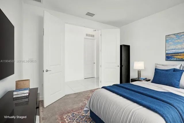 a view of a house with backyard and porch