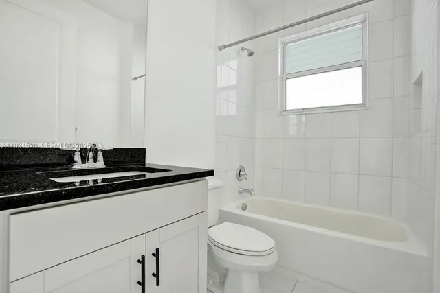 a view of a backyard with a garden