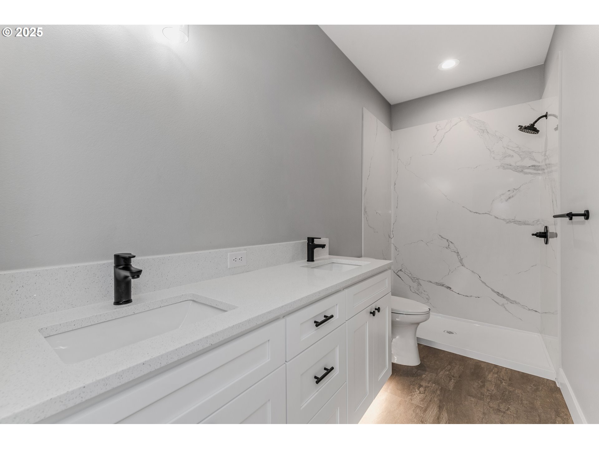 623 Vertex Street Winlock, WA 98596 - Photo 18 of 38 a bathroom with a sink a toilet and shower