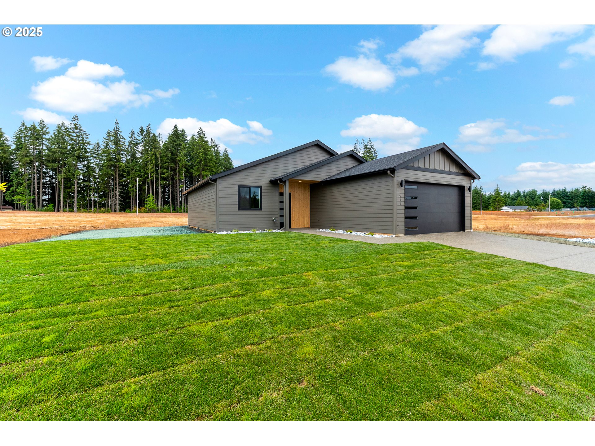 623 Vertex Street Winlock, WA 98596 - Photo 2 of 38 a view of a house with a yard