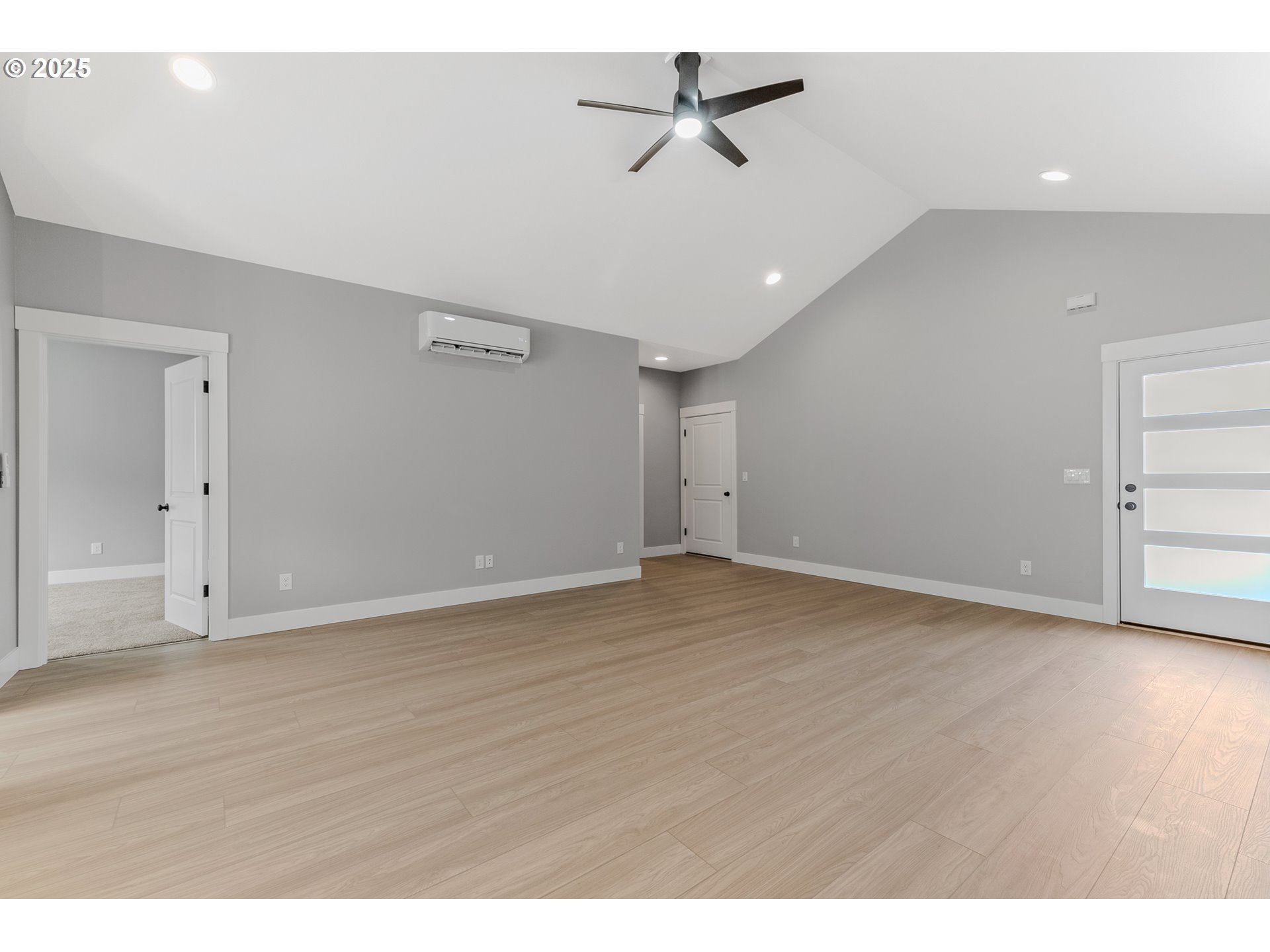 623 Vertex Street Winlock, WA 98596 - Photo 5 of 38 a view of a room with wooden floor and ceiling fan