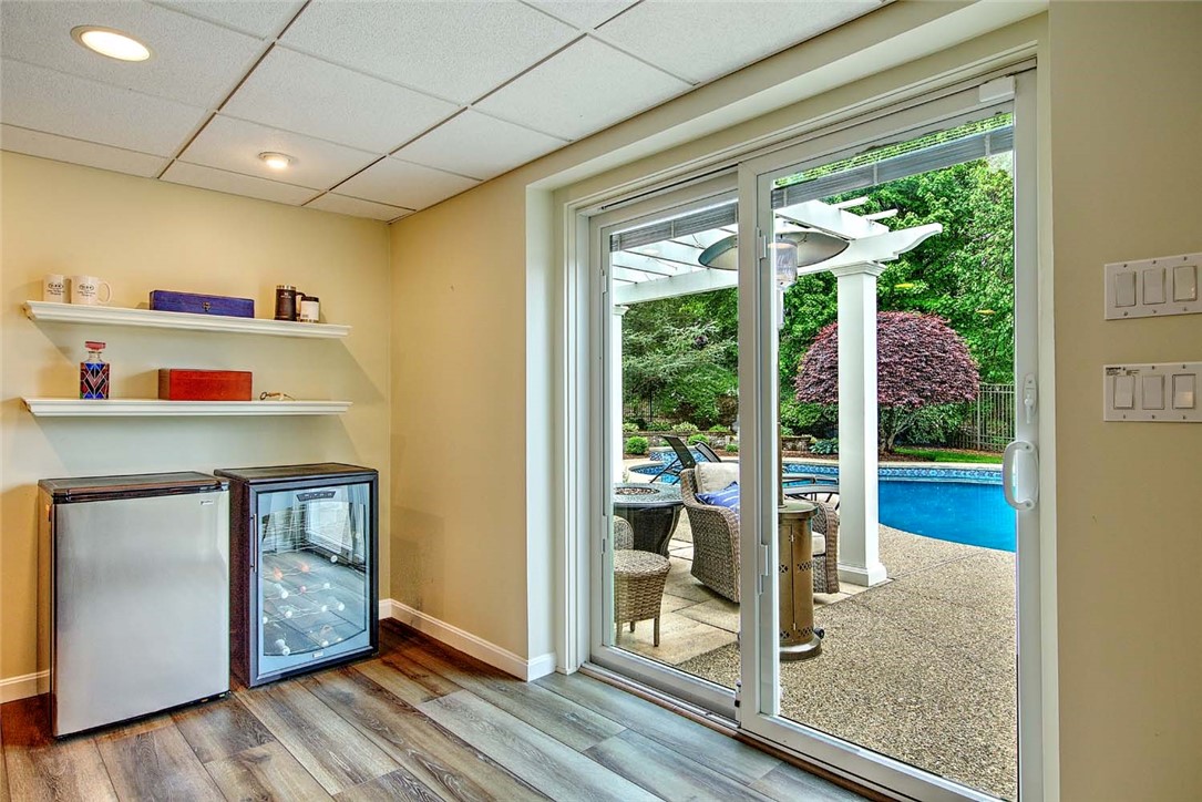 96 Windsong Road Cumberland, RI 02864 - Photo 42 of 50 Lower-level slider to the pool area