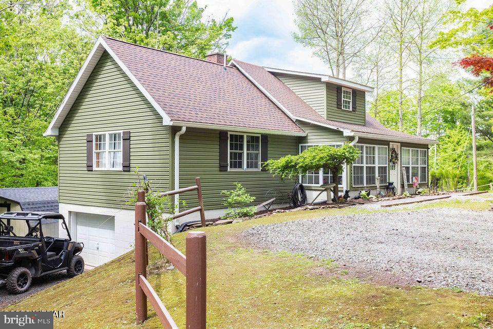 2025 Whiskey Run Road Muncy Valley, PA 17758 - Photo 9 of 54 Charming green home in a serene setting.