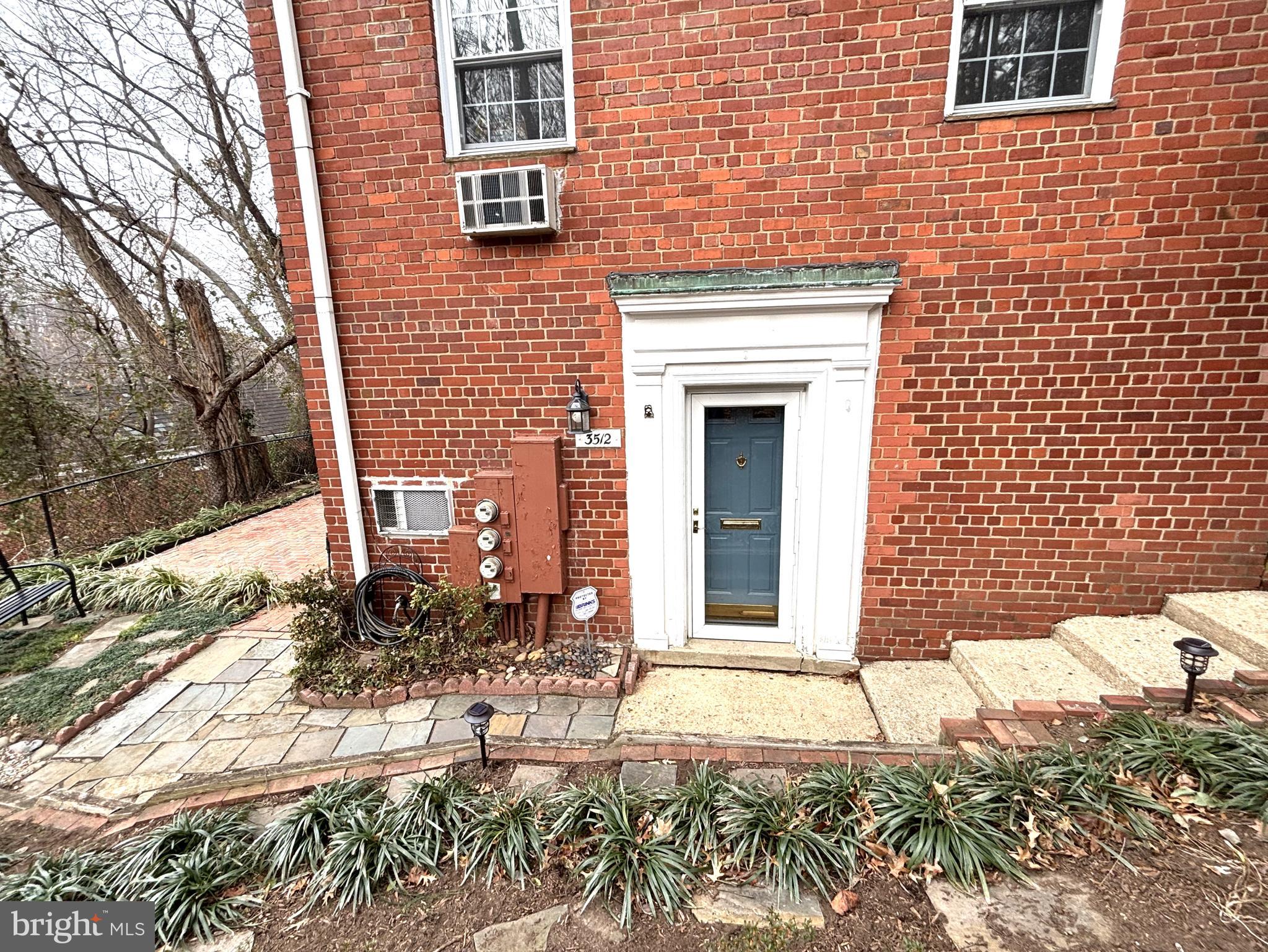 3512 Gunston Road Alexandria, VA 22302 - Photo 1 of 29 a front view of a house with a yard