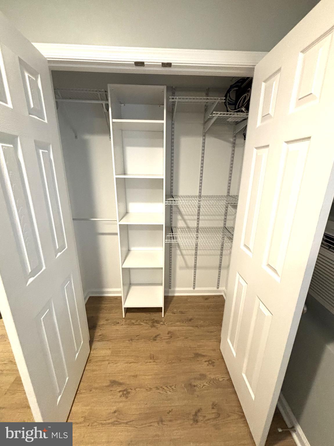 3512 Gunston Road Alexandria, VA 22302 - Photo 15 of 29 a view of empty room with wooden floor and door