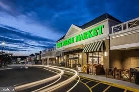 3512 Gunston Road Alexandria, VA 22302 - Photo 24 of 29 a view of a patio with table and chairs and potted plants