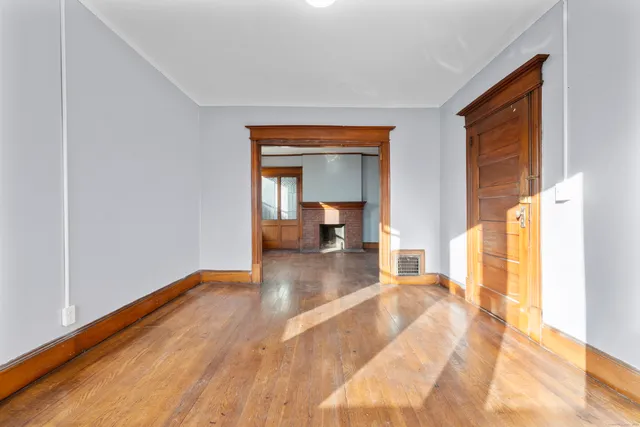 a view of a living room with a large window