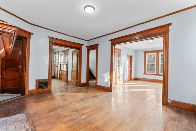 wooden floor and windows in an empty room
