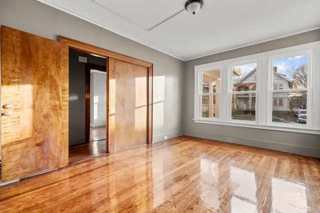 a view of an empty room with a window