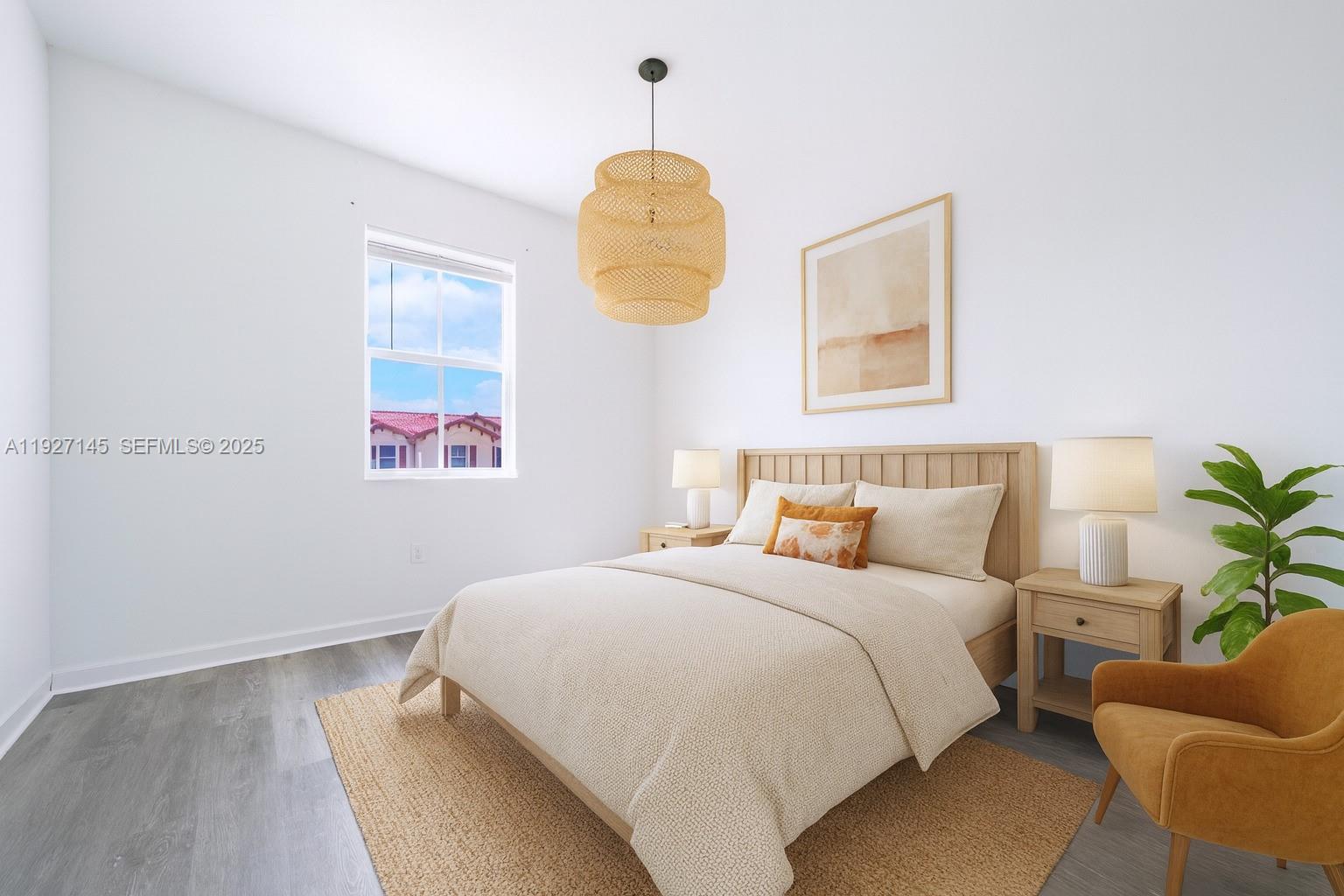 12661 Northwest 23rd Place Miami, FL 33167 - Photo 18 of 34 a bedroom with bed and a window