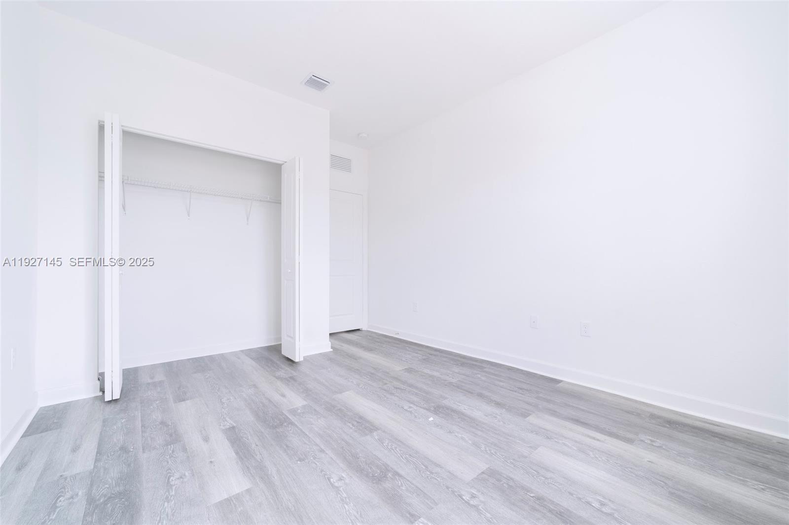 12661 Northwest 23rd Place Miami, FL 33167 - Photo 28 of 34 a view of an empty room