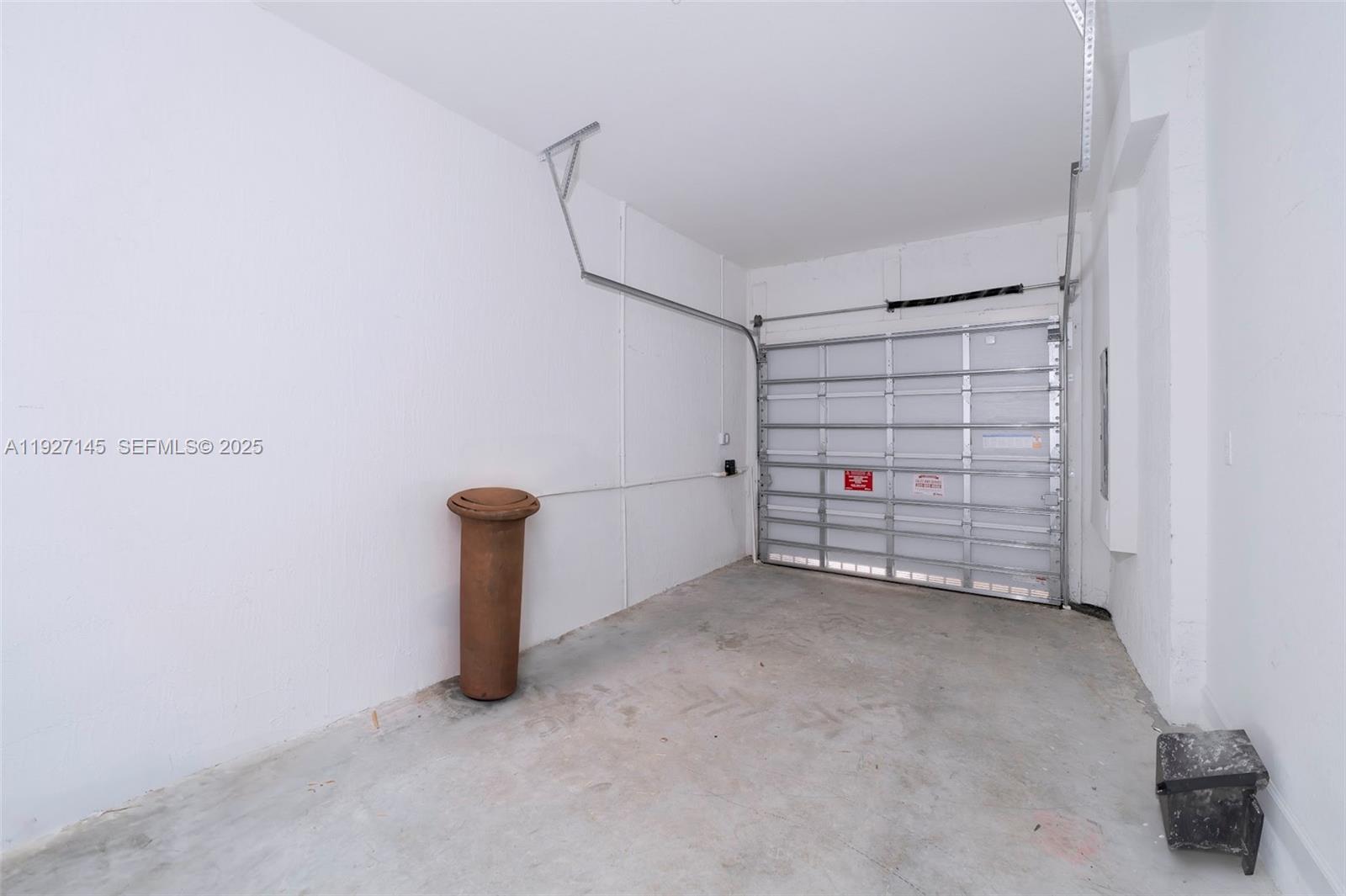 12661 Northwest 23rd Place Miami, FL 33167 - Photo 34 of 34 a view of an empty room with storage