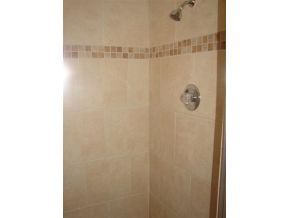 3197 Northeast Eastman Palm Bay, FL 32905 - Photo 11 of 11 a bathroom with a shower
