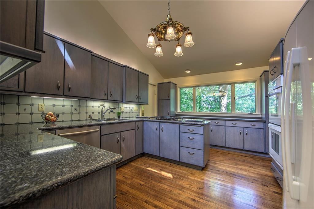150 Riding Trail Lane Fox Chapel, PA 15215 - Photo 5 of 25 Well equipped kitchen with new granite and plenty of solid wood cabinetry