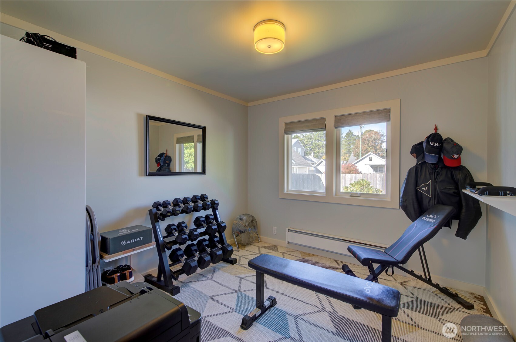 1115 34 Street Seaview, WA 98644 - Photo 21 of 31 a living room with furniture and a window