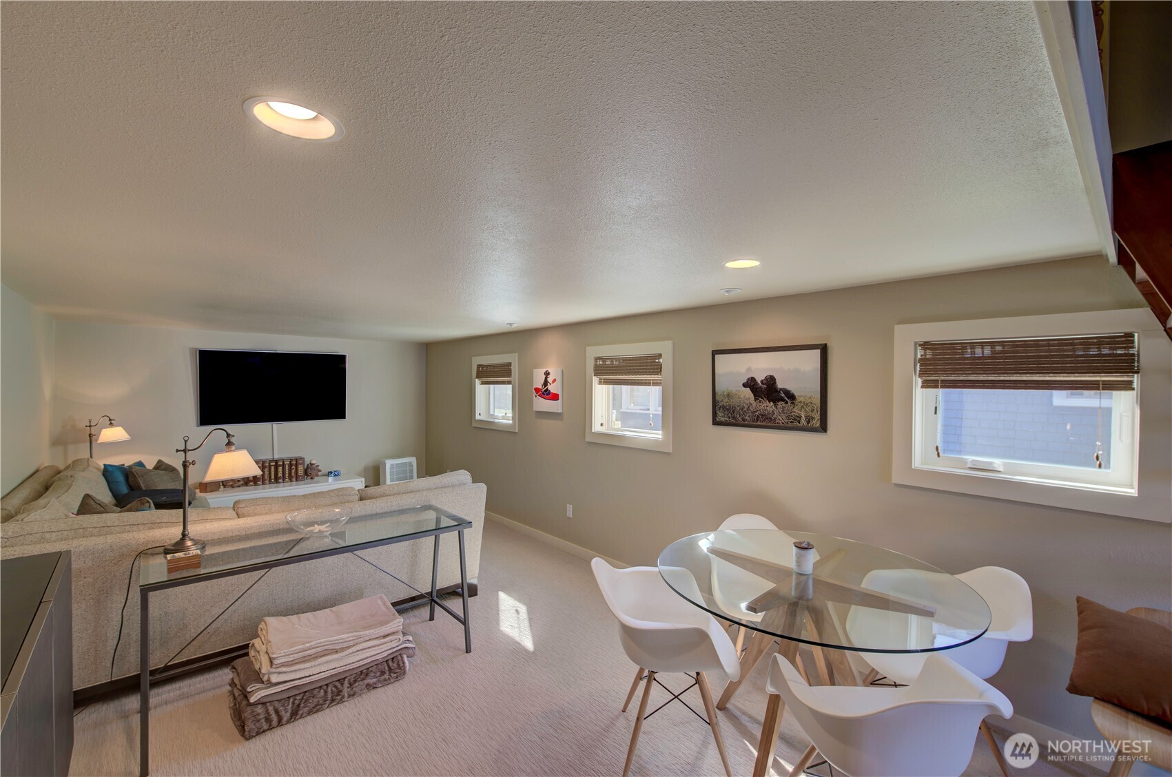 1115 34 Street Seaview, WA 98644 - Photo 22 of 31 a living room with furniture and a flat screen tv