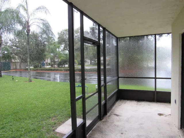 a bathroom with a shower and a toilet