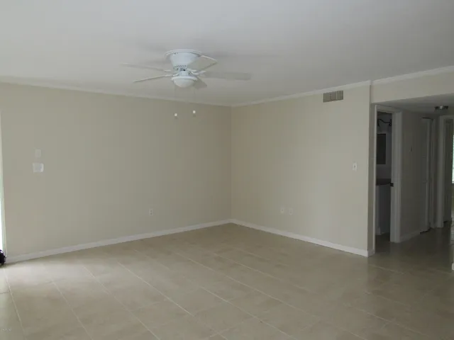 a view of swimming pool with outdoor seating and yard