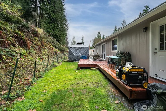 a backyard of a house with lots of green space