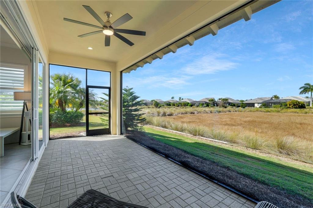 5167 Andros Drive Naples, FL 34113 - Photo 31 of 32 a view of swimming pool with lake view and mountain view