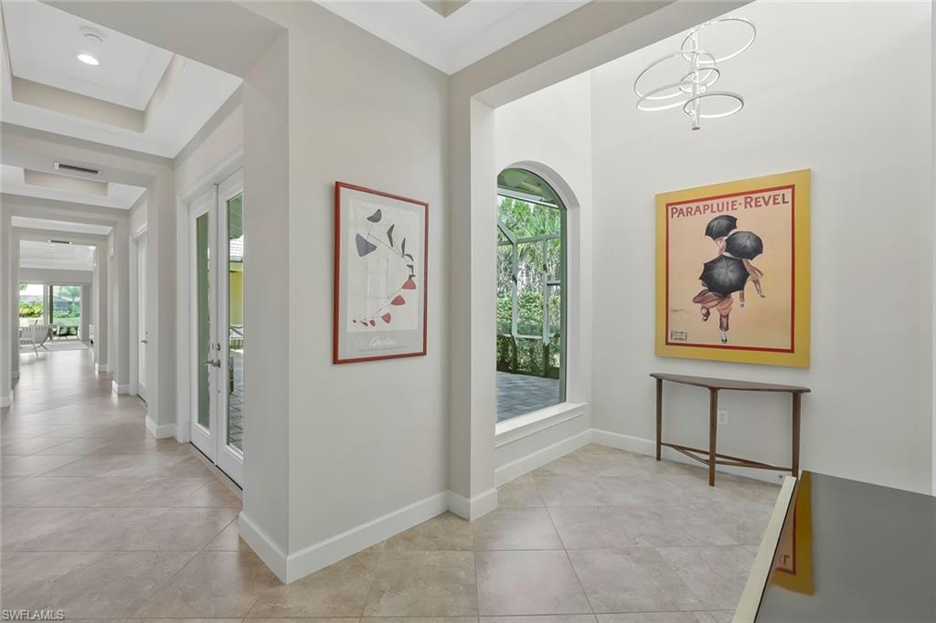 5167 Andros Drive Naples, FL 34113 - Photo 7 of 32 a view of a hallway with interior of the house