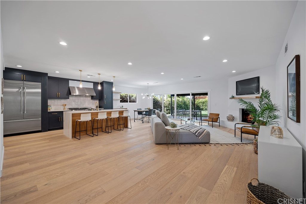 13151 Morrison Street Sherman Oaks, CA 91423 - Photo 2 of 26 a living room with furniture and kitchen view