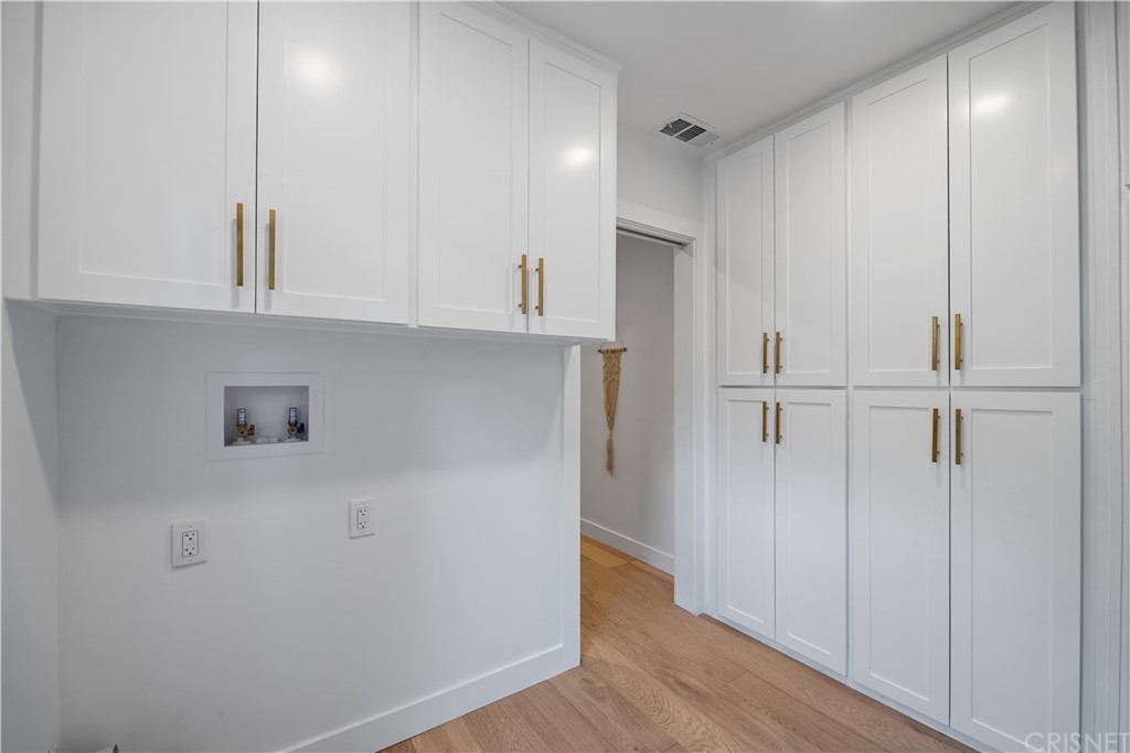 13151 Morrison Street Sherman Oaks, CA 91423 - Photo 14 of 26 a view of cabinets and wooden floor