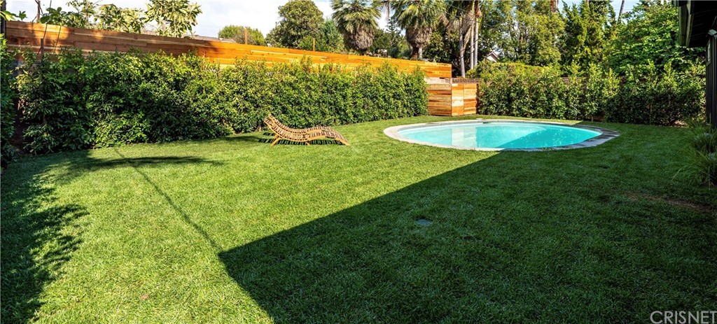13151 Morrison Street Sherman Oaks, CA 91423 - Photo 25 of 26 a view of a swimming pool with a yard