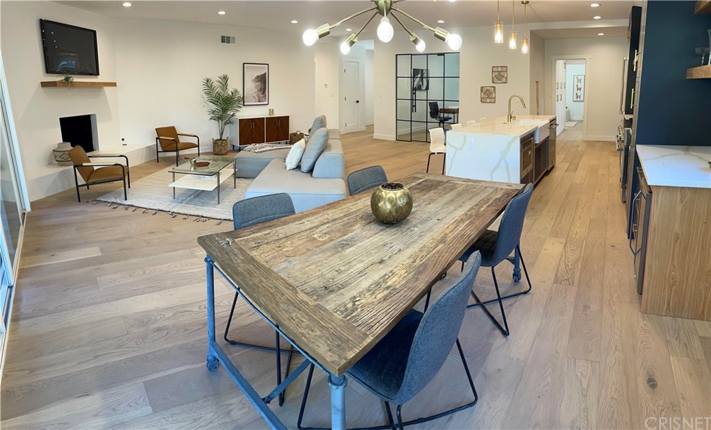 13151 Morrison Street Sherman Oaks, CA 91423 - Photo 8 of 26 a living room with furniture and a wooden floor