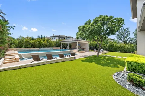 a living room with furniture and windows