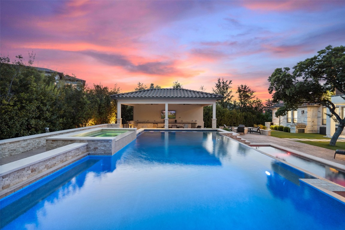 403 Woodside Terrace Austin, TX 78738 - Photo 17 of 38 a view of a house with swimming pool and sitting area