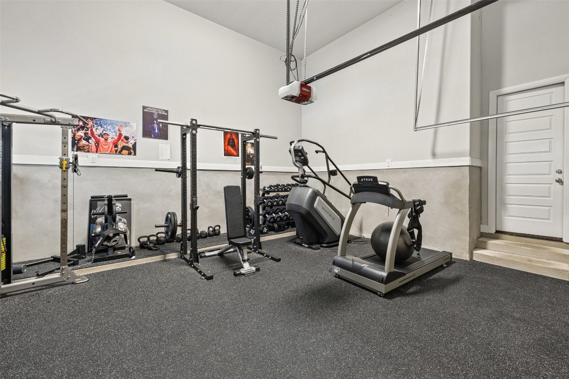403 Woodside Terrace Austin, TX 78738 - Photo 27 of 38 a view of a room with gym equipment