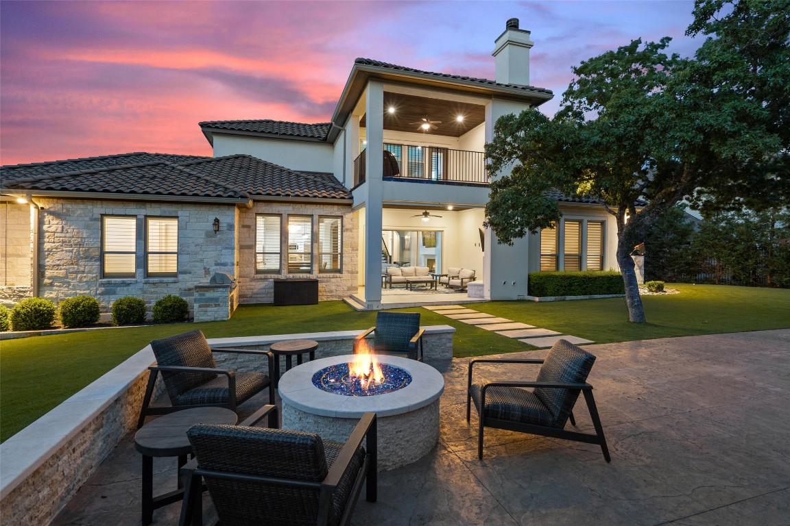 403 Woodside Terrace Austin, TX 78738 - Photo 28 of 38 a view of a house with swimming pool and porch with furniture
