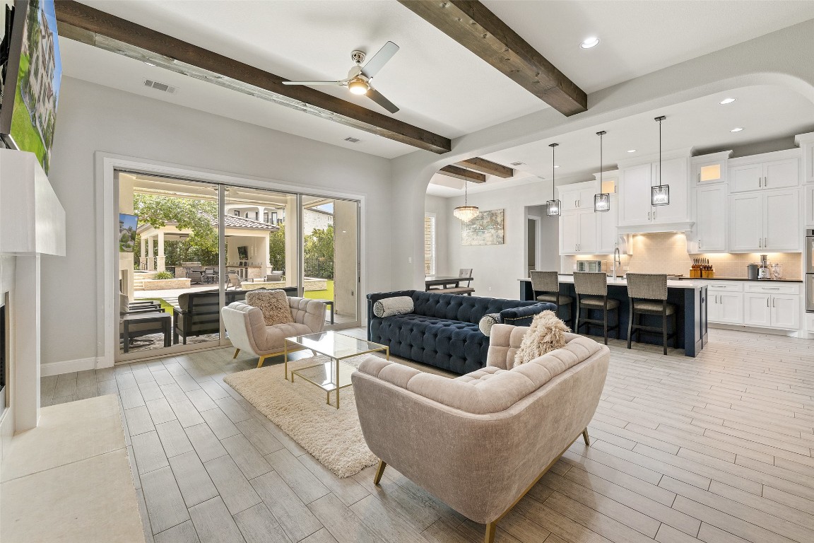403 Woodside Terrace Austin, TX 78738 - Photo 6 of 38 a living room with furniture and a large window