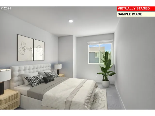 a bedroom with bed and a window