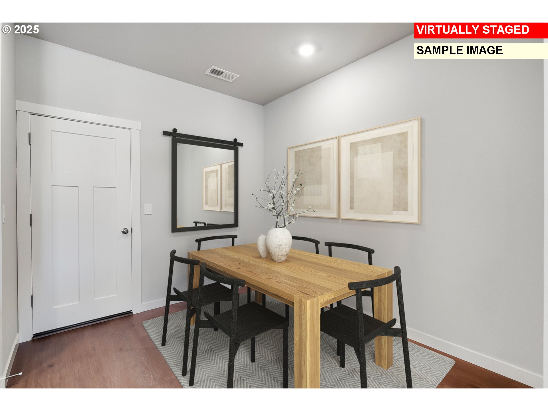 15066 Southwest 165th Avenue Tigard, OR 97224 - Photo 3 of 24 a view of a dining room with furniture and wooden floor