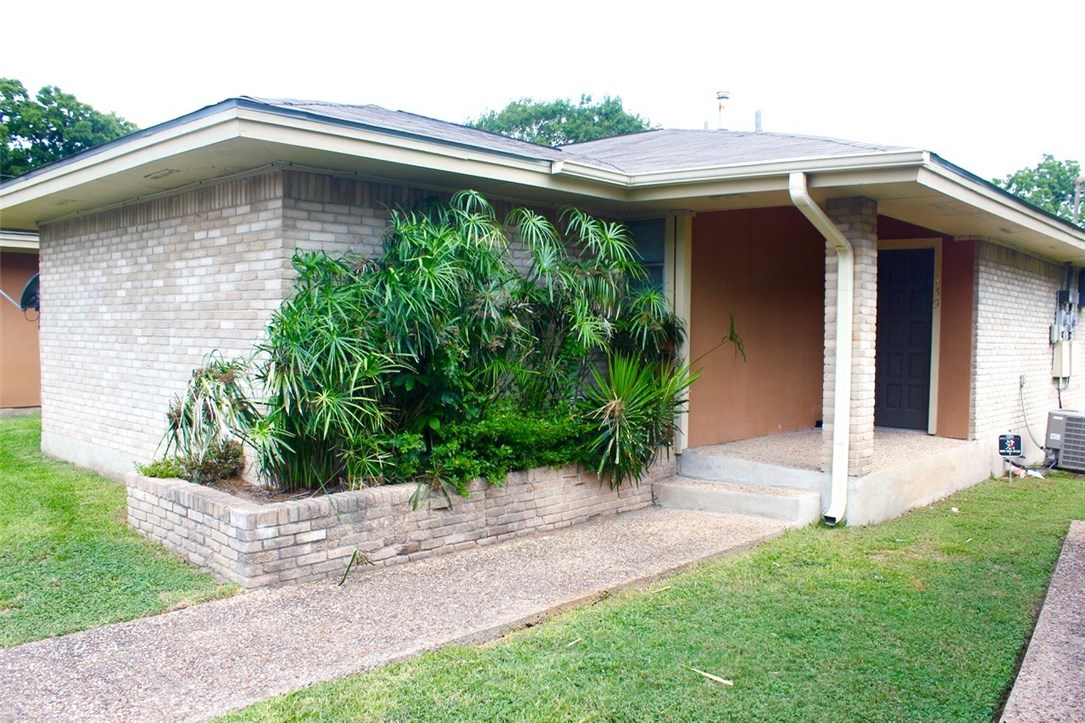 8501 Cameron Road, Unit 139 Austin, TX 78754 - Photo 1 of 1 a front view of a house with a yard