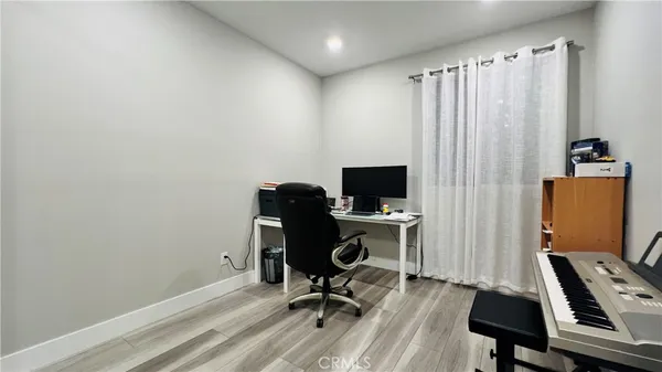 a bedroom with a bed and a table
