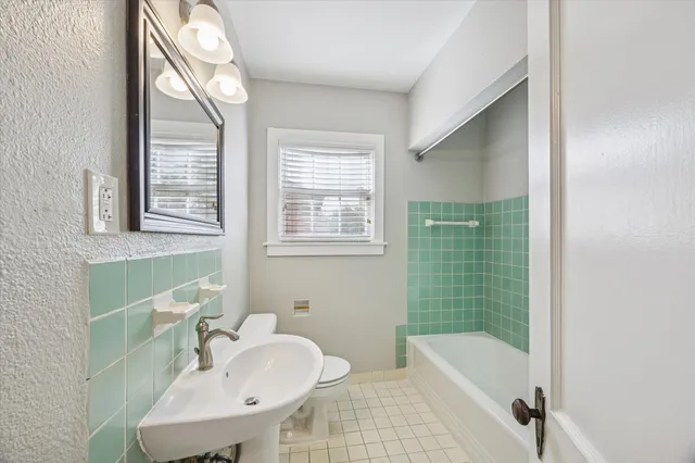 a bathroom with a sink and a bathtub