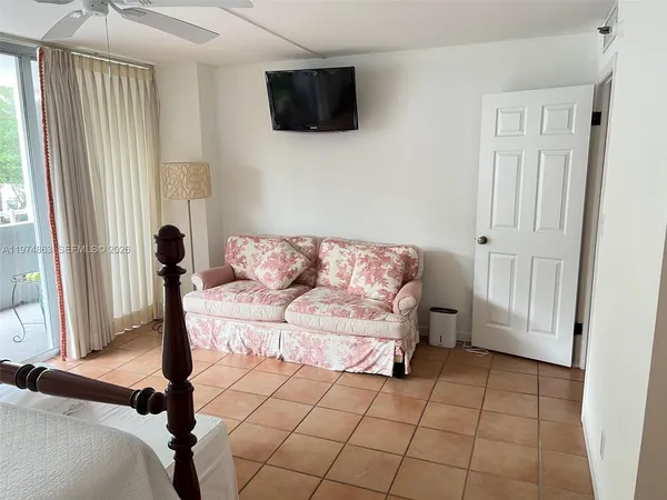 a view of a livingroom with furniture and windows