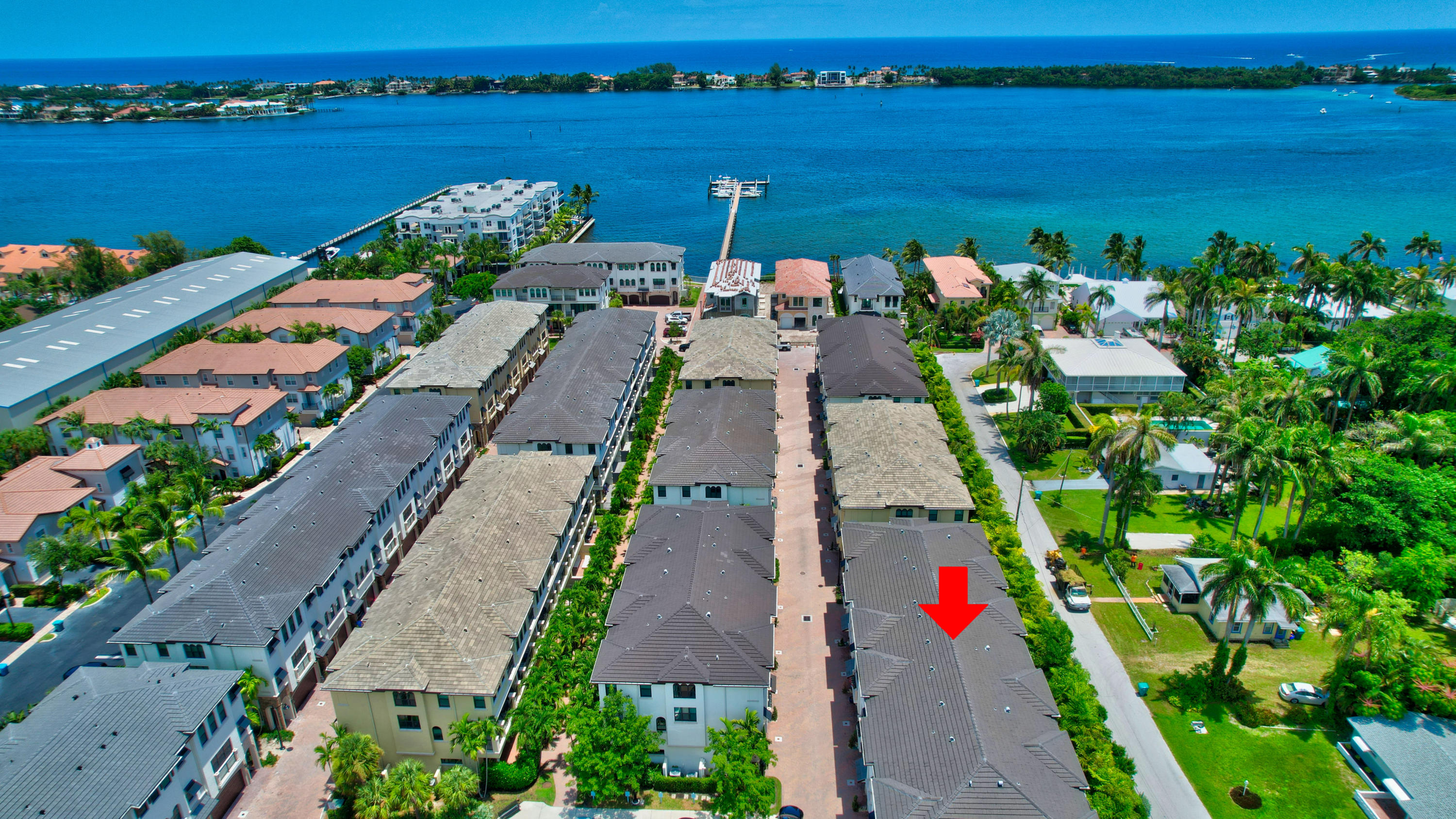 608 Windward Circle Boynton Beach, FL 33435 - Photo 37 of 42 a view of a lake with a yard