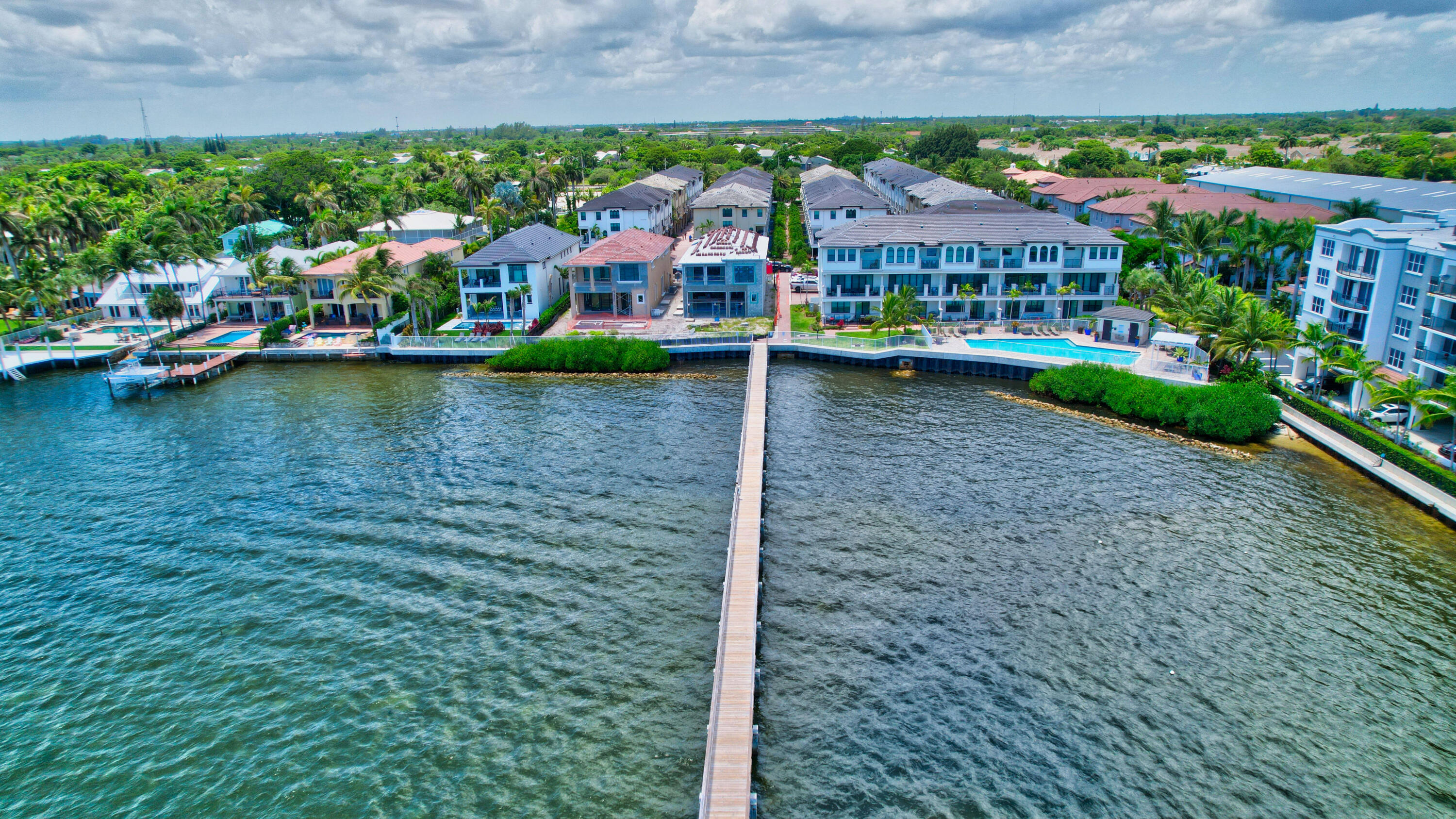 608 Windward Circle Boynton Beach, FL 33435 - Photo 40 of 42 a view of a lake with a building in the background