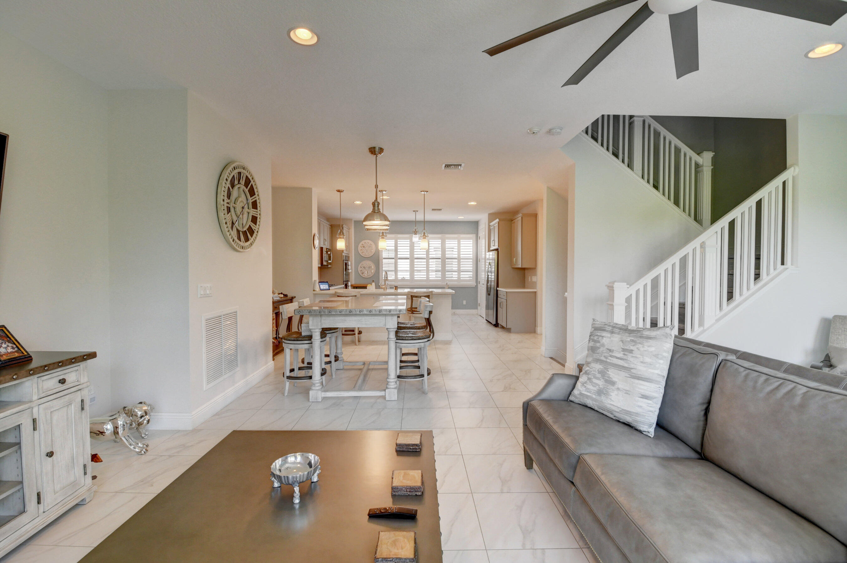 608 Windward Circle Boynton Beach, FL 33435 - Photo 8 of 42 a living room with furniture and a table