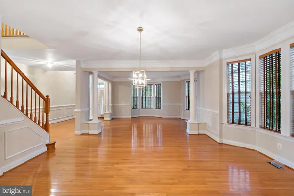 a living room with a fireplace and a window